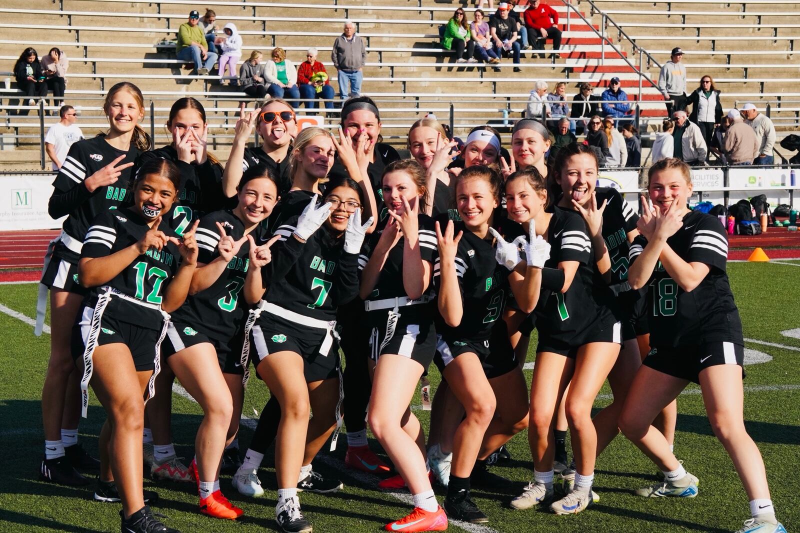The Badin High School girls flag football team celebrated a victory in its first-ever game on Saturday night at La Salle. Chris Vogt/CONTRIBUTED PHOTO