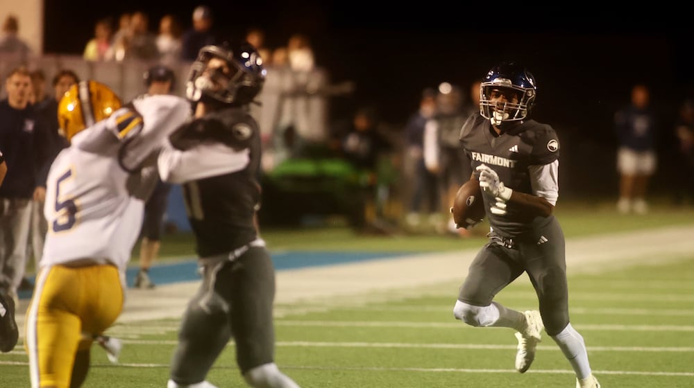 Fairmont's Damien Pattin runs against Springfield on Friday, Oct. 17, 2025, at Roush Stadium in Kettering. David Jablonski/Staff