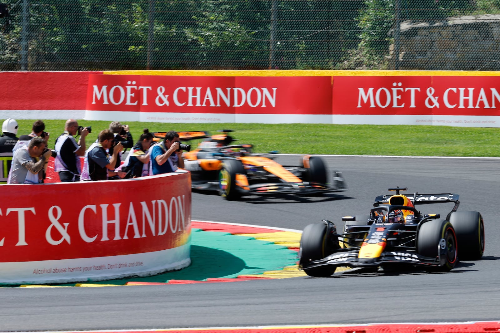 Red Bull driver Max Verstappen of the Netherlands, right, steers his car during the sprint race ahead of the Formula One Grand Prix at the Spa-Francorchamps racetrack in Spa, Belgium, Saturday, July 26, 2025. (AP Photo/Geert Vanden Wijngaert)