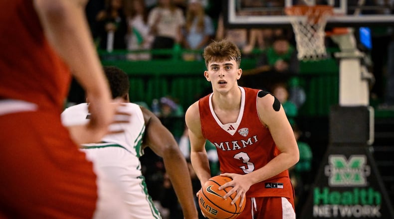 Miami (Ohio) Guard Luke Skaljac (3) looks to pass against Marshall during the second half of an NCAA college Basketball game, Saturday, Feb. 7, 2026, in Huntington, W.Va. (AP Photo/Tyler Evert)