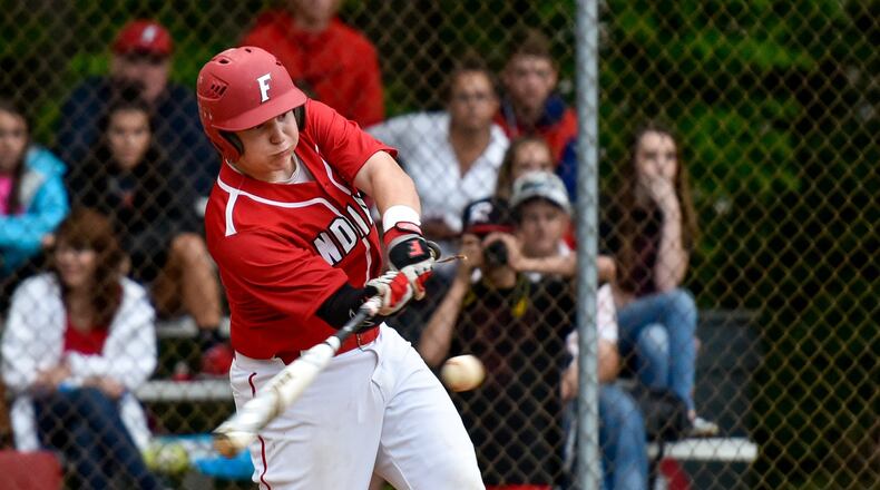 Fairfield’s Nolan McWhorter makes contact with the ball during the Indians’ 2-1 Division I sectional loss to Elder on May 12, 2016, at Joe Nuxhall Field. NICK GRAHAM/STAFF