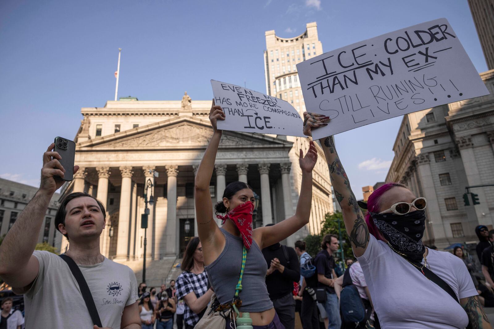 Demonstrators hold signs and chant during a protest against deportation by Immigration and Customs Enforcement in New York, Wednesday, June 11, 2025. (AP Photo/Yuki Iwamura)