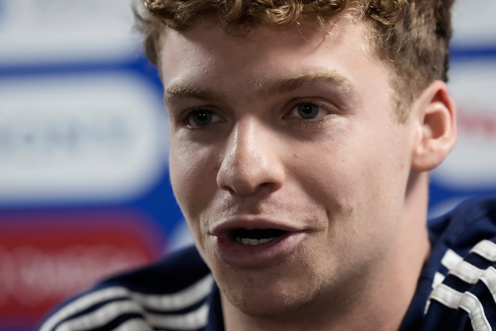 Leon Marchand from France speaks to the media during the press conference at the World Aquatics Championships in Singapore, Saturday, July 26, 2025. (AP Photo/Lee Jin-man)