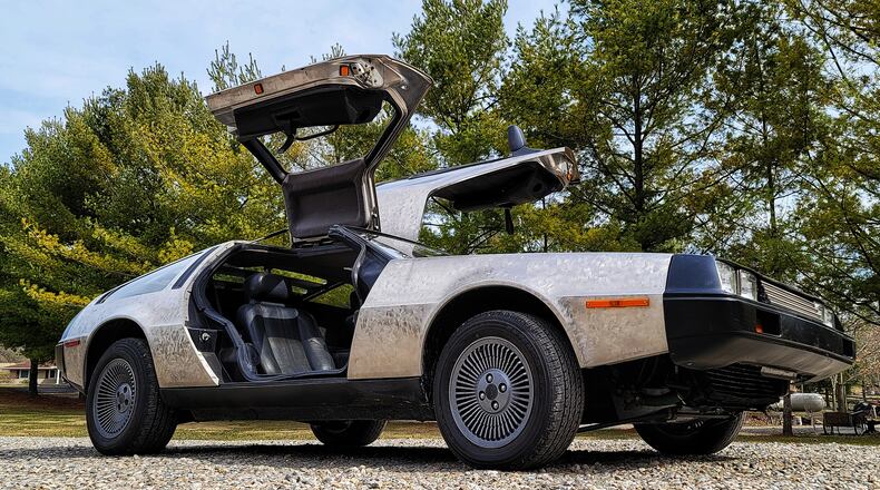 Jim Bridges is selling his 1981 DeLorean he has owned since the mid-1980s. The car has just over 17,300 original miles on it and has a custom finish Bridges did himself to match a stainless steel jeep he built. NICK GRAHAM / STAFF