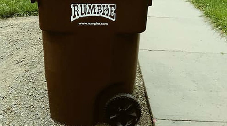 A woman in Middletown woman started a Facebook event to honor and remember David J. Evans, the 52-year-old Rumpke employee who was struck while collecting trash in Middletown on Monday. Pictured is the Rumpke trash can in Lebanon topped with a vase of flowers. CONTRIBUTED