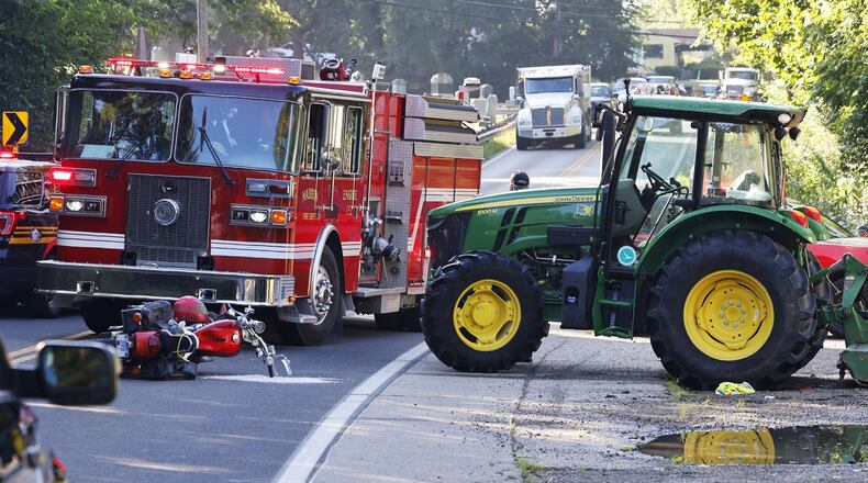 A crash involving a motorcycle and a tractor occurred at around 8:30 a.m. Tuesday, Aug. 8, 2023 on Ohio 122 near Hursh Road in Madison Twp. NICK GRAHAM/STAFF