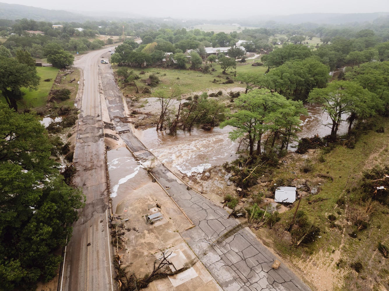 The flooded Guadalupe River in Hunt, Texas, near the site of Camp Mystic, on Saturday, July 5, 2025. (Carter Johnston/The New York Times)