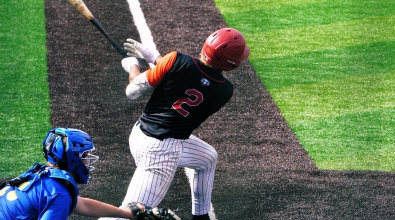 Lakota West's Braydon Johnson takes a swing during his Division I state semifinal game against Olentangy on Saturday at Thurman Munson Memorial Stadium in Canton. CHRIS VOGT / CONTRIBUTED