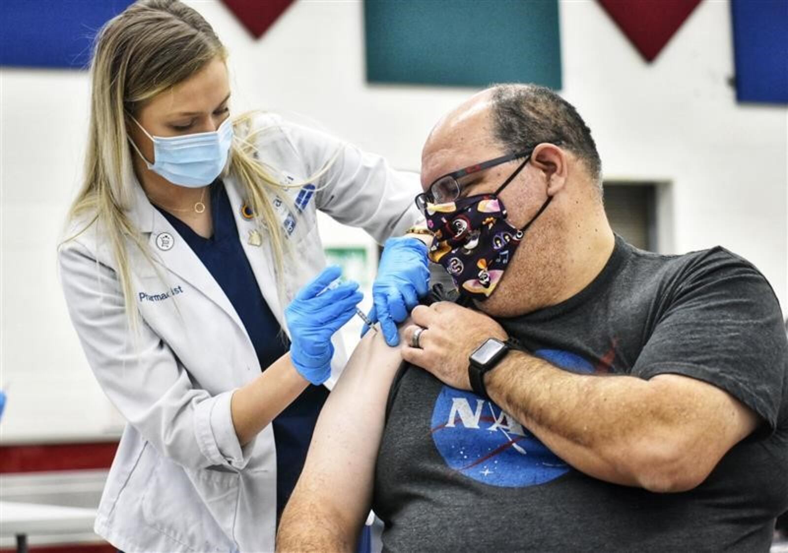 Nearly 1,900 Lakota school employees are scheduled today to receive the first of two coronavirus vaccinations. Hundreds of Lakota workers lined up starting this morning at Lakota West High School to begin receiving the injections provided by the Kroger Company in a partnership with Lakota. (PHOTO BY NICK GRAHAM\ Journal-News)