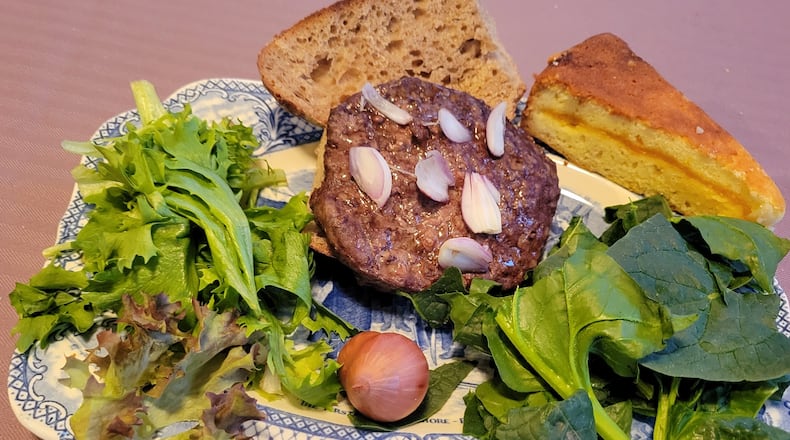 Dinner with items from five oxford winter vendors includes 5 Oaks lettuce, 7 wonders spinach, Stoney Hedgerow shallots, Caraway Farm hamburger and Birch Creek bread cake. CONTRIBUTED