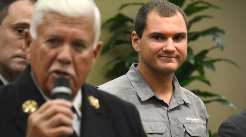 Tyler Tacy was honored Tuesday, Oct. 9, by the city of Fairfield for helping to save his father, Steve, after he was electrocuted at his warehouse on Le Saint Drive in July. MICHAEL D. PITMAN/STAFF