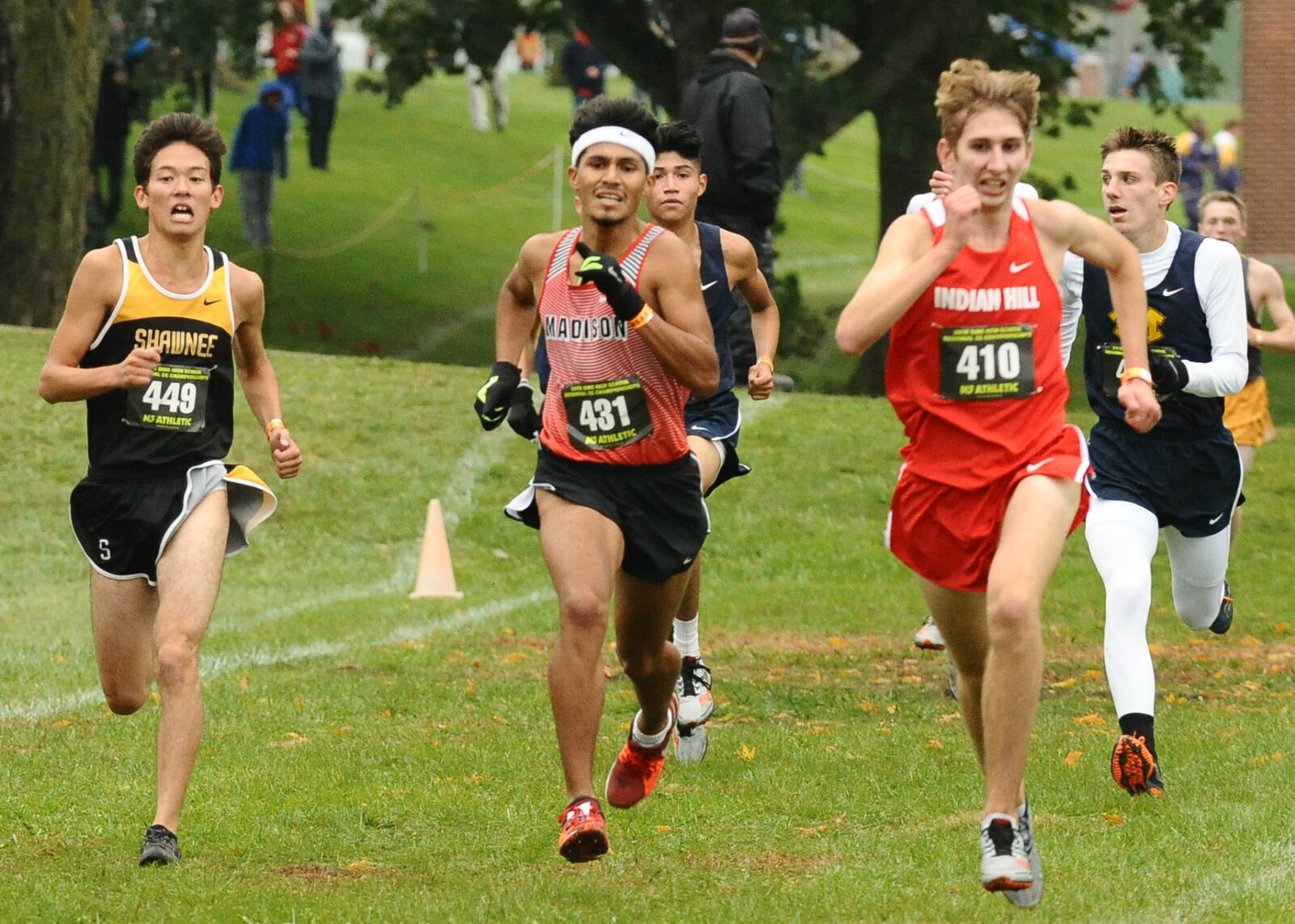 Madison's Nathan Thobe (431) tries to break away from the pack Saturday during the Division II regional cross country meet in Troy. CONTRIBUTED PHOTO BY GREG BILLING