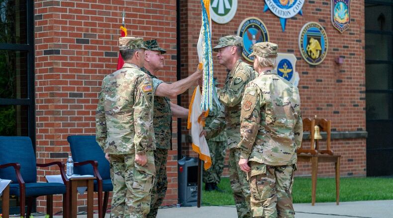 U.S. Air Force Brigadier Gen. Kenneth R. Council, Jr. receives the guidon from USTRANSCOM deputy commander U.S. Marine Corps Lt. Gen. John Broadmeadow during a change of command ceremony at Scott Air Force Base, Illinois on June 1, 2019. Council relieves U.S. Army Major Gen. Daniel R. Ammerman as the 14th commander of the JTRU. (Photo By: Osmin “Oz” Suguitan, USTRANSCOM/PA)