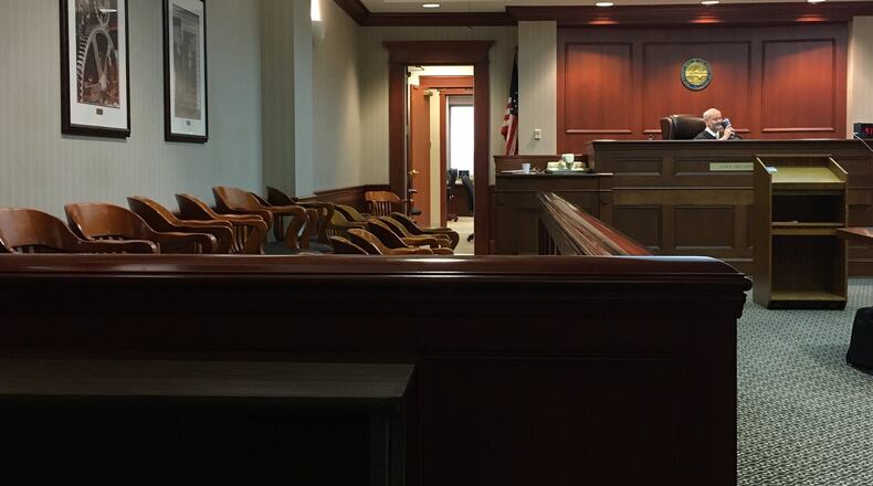 Many cases were continued through paper orders rather than calling cases in open court Monday in Butler County Common Pleas Judge Greg Stephen’s court due to coronavirus concerns. The usually crowded courtrooms were nearly empty. LAUREN PACK/STAFF