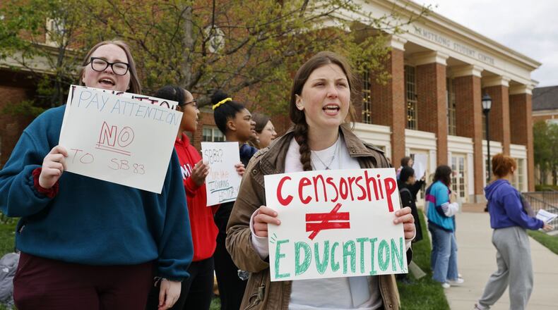 A proposed Ohio bill now in the state senate today drew a public protest by Miami University students on campus who claim the legislation would smother free speech, school inclusion efforts and more at state colleges. Dozens of Miami students rallied against Ohio Senate Bill 83 this afternoon in front the school’s Armstrong Student Center on the school’s main Oxford campus. (Photo By Nick Graham\Journal-News)
