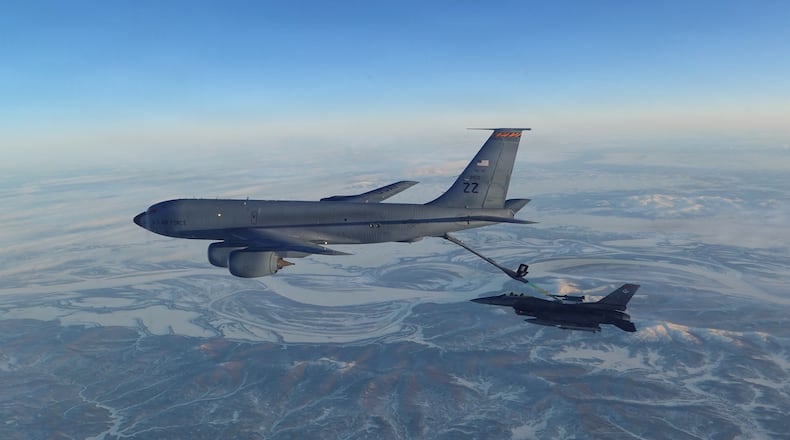 This photo provided by the U.S. Department of Defense shows a North American Aerospace Defense Command F-16 fighter refueling from a KC-135 Stratotanker over western Alaska on Thursday, Feb. 19, 2026. (U.S. Department of Defense via AP)