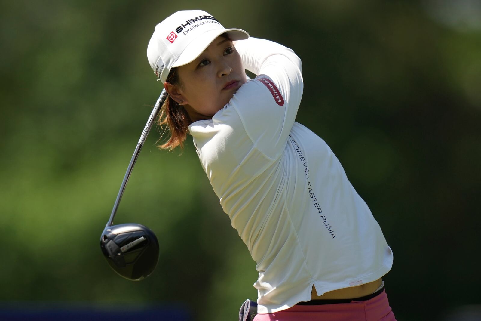 Mao Saigo, of Japan, hits from the second tee during the third round of the Chevron Championship LPGA golf tournament Saturday, April 26, 2025, in The Woodlands, Texas. (AP Photo/Eric Gay)