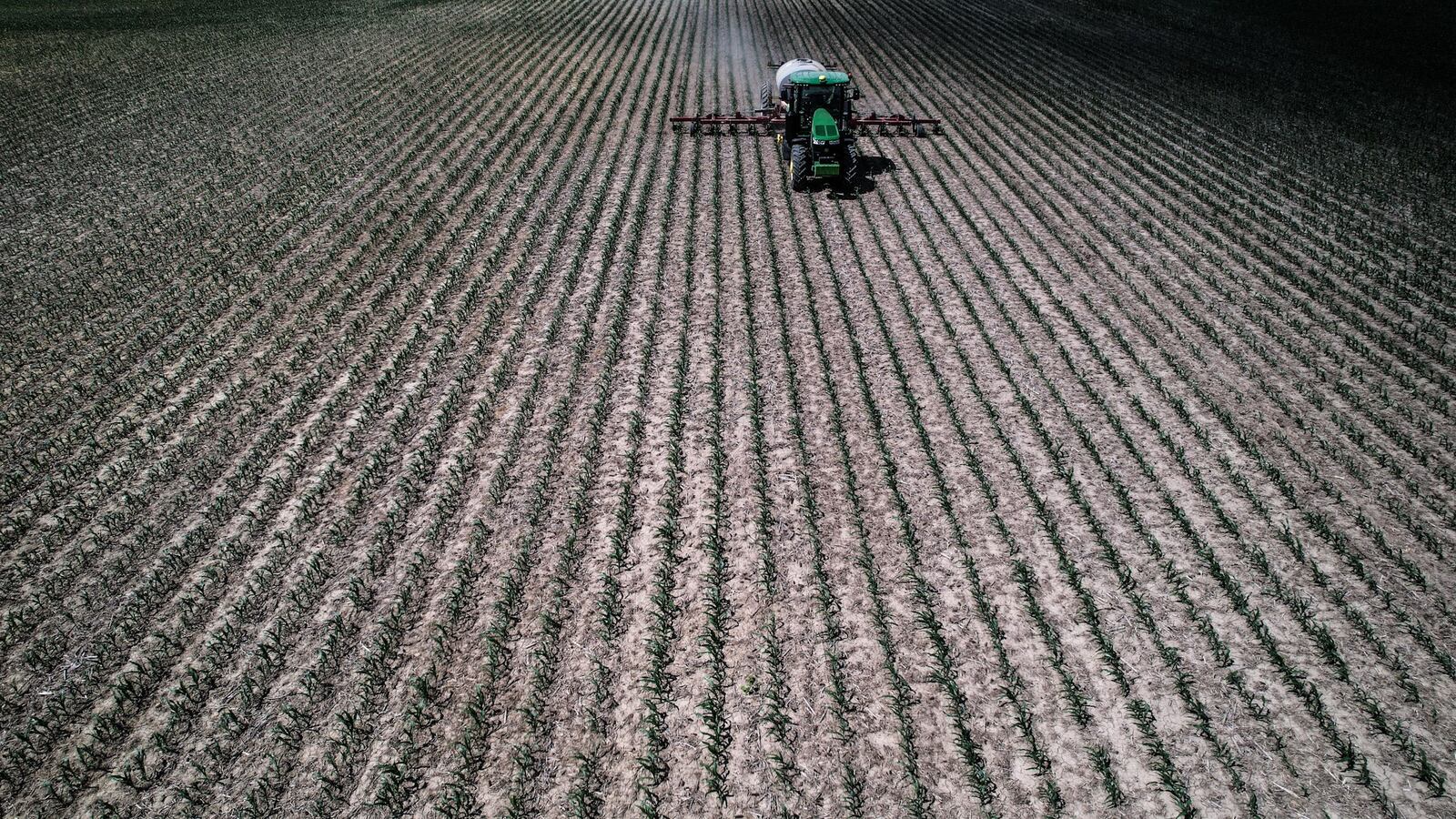 Tom Sears, from Farmersville, applies nitrogen on his corn crop near Hemple Road Wednesday May 31, 2023. Sears has been farming in western Montgomery County for 47 years. JIM NOELKER/STAFF