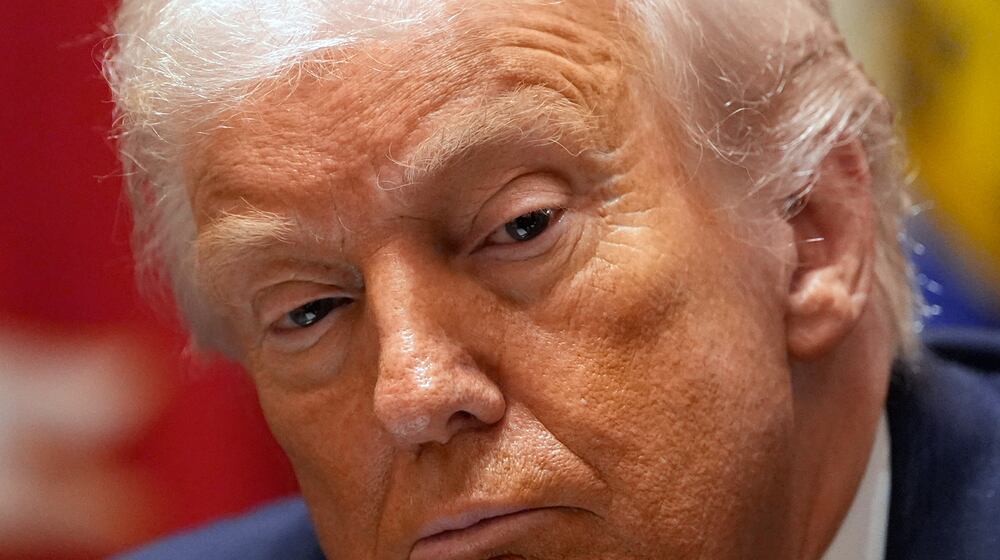 President Donald Trump listens during a roundtable on farm subsidies in the Cabinet Room of the White House, Monday, Dec. 8, 2025, in Washington. (AP Photo/Alex Brandon)