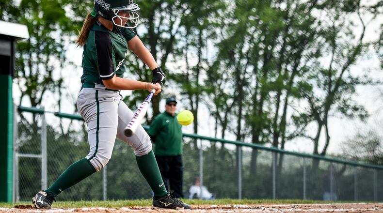 Badin’s Shelby Schmitt gets a piece of the ball during their softball game against Ross Thursday, April 27 at Joyce Park in Fairfield. NICK GRAHAM/STAFF