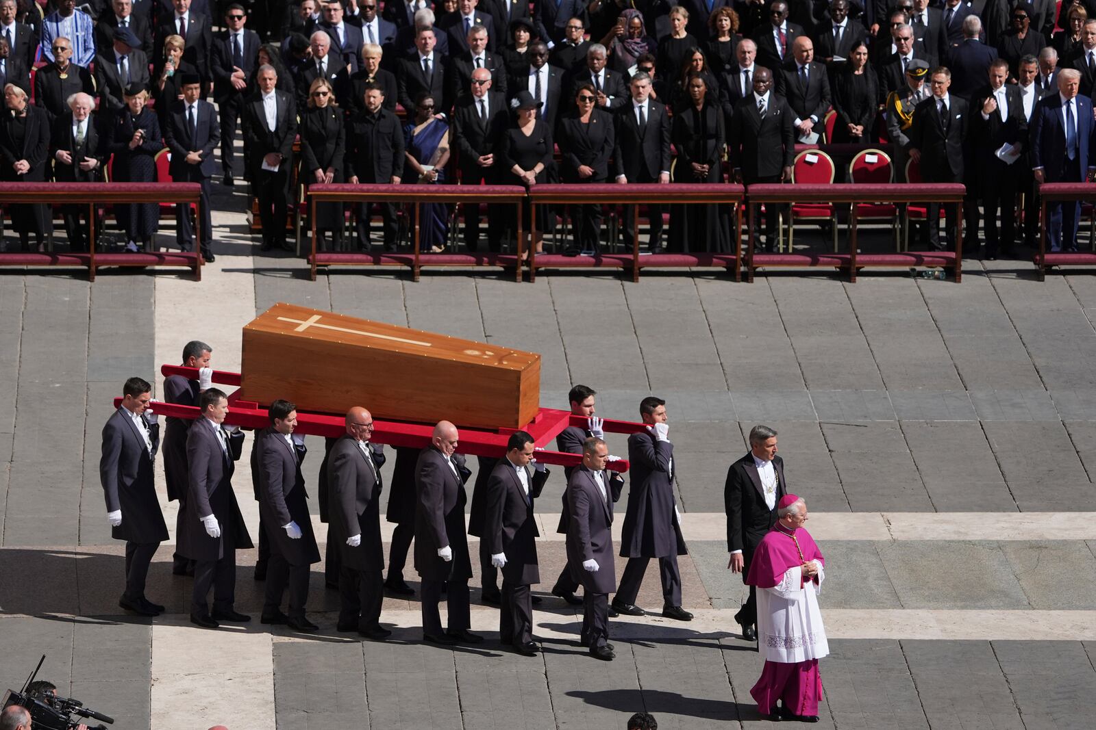 The coffin of Pope Francis is carried into St Peter's Square for his funeral, at the Vatican, Saturday, April 26, 2025. (AP Photo/Evan Vucci)
