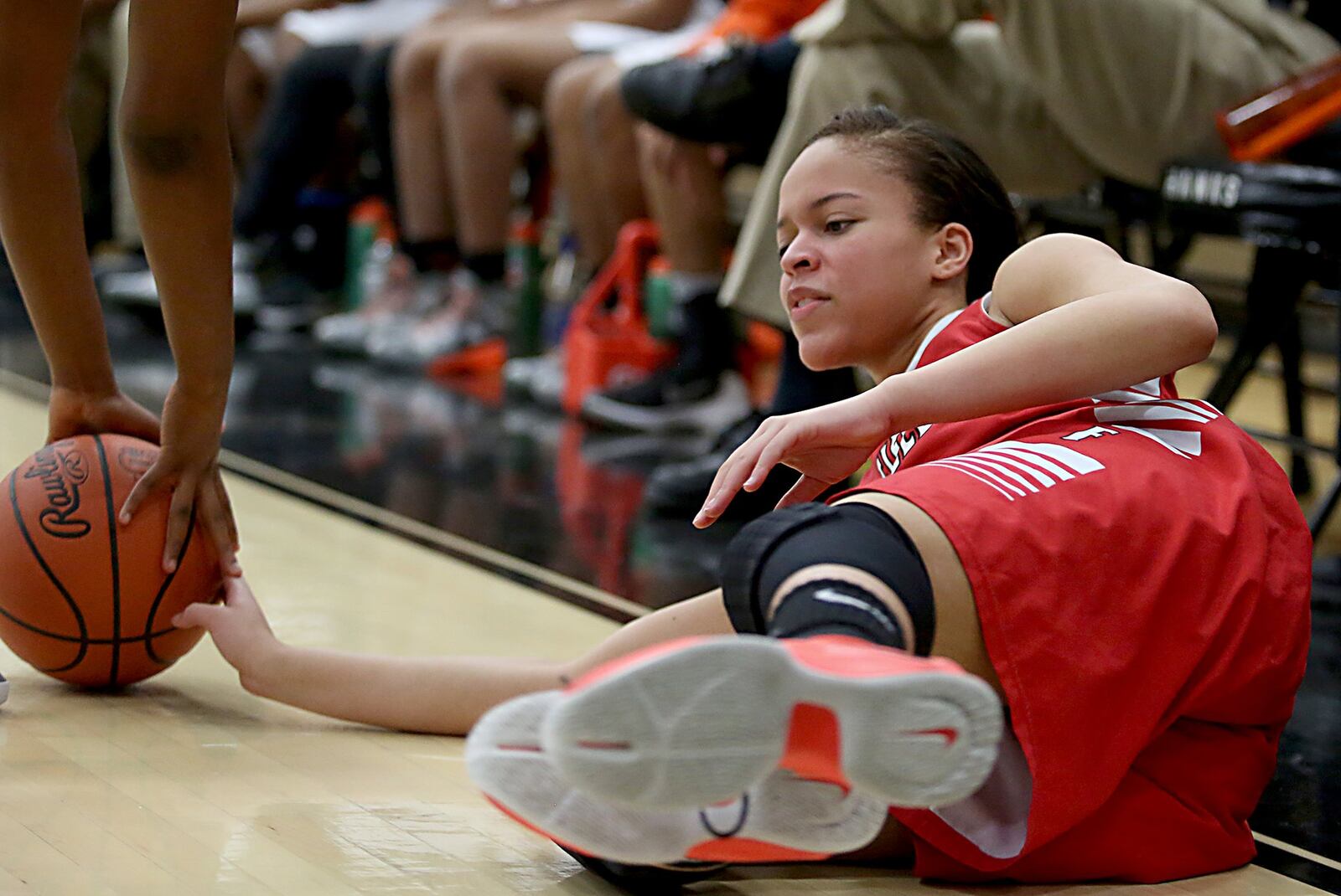 Fairfield forward D.J. Haygood slides out of bounds while trying to keep the ball away from Withrow on Saturday afternoon during a Division I sectional game at Lakota East. CONTRIBUTED PHOTO BY E.L. HUBBARD