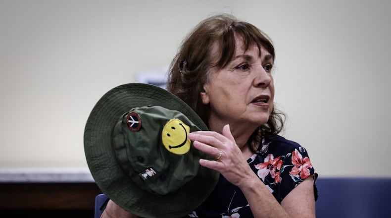 Vietnam army nurse Abby Auclair talks about her time as a nurse during the Vietnam War to the exercise class book club at the Wright Library in Oakwood. JIM NOELKER/STAFF