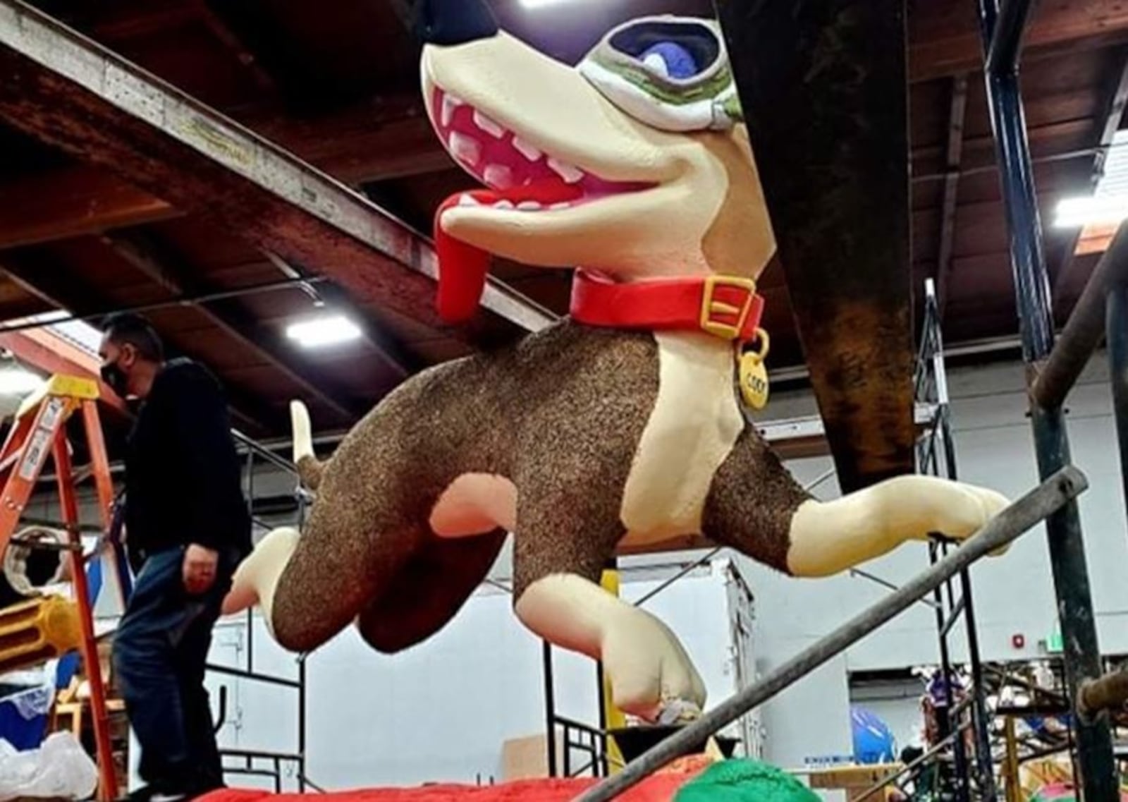 Michael Brown and Sandra Simpson, floral designers at Flowers by Roger in Middletown, are volunteering this week in California to bring the Tournament of Rose Parade floats to life. MICHAEL BROWN/SUBMITTED