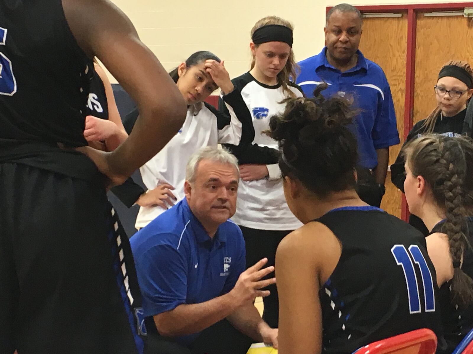 Cincinnati Christian coach Paul Owens makes a point to his team during a timeout Wednesday night at Norwood. RICK CASSANO/STAFF