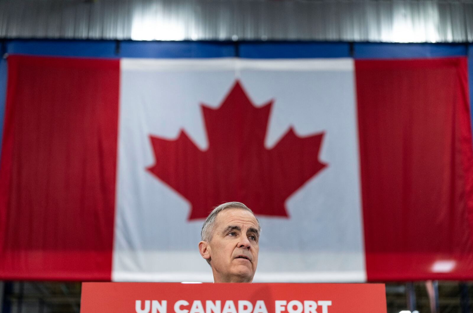 Liberal Leader Mark Carney makes an announcement during a campaign stop in Saint-Eustache, Quebec, Tuesday, April 15, 2025. (Christinne Muschi/The Canadian Press via AP)