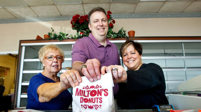 From left, Joyce Campbell, Jay and Amy Byrne are the new co-owners of Milton's Donuts located at 3533 Roosevelt Blvd. in Middletown. NICK DAGGY / STAFF