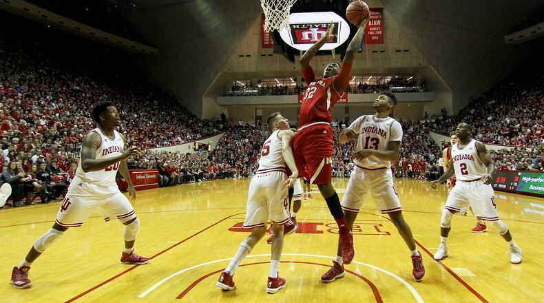 BLOOMINGTON, IN - DECEMBER 28:  Jordy Tshimanga #32 of the Nebraska Cornhuskers attempts a layup over Zach McRoberts #15 of the Indiana Hoosiers in the first half at Assembly Hall on December 28, 2016 in Bloomington, Indiana. (Photo by Dylan Buell/Getty Images)