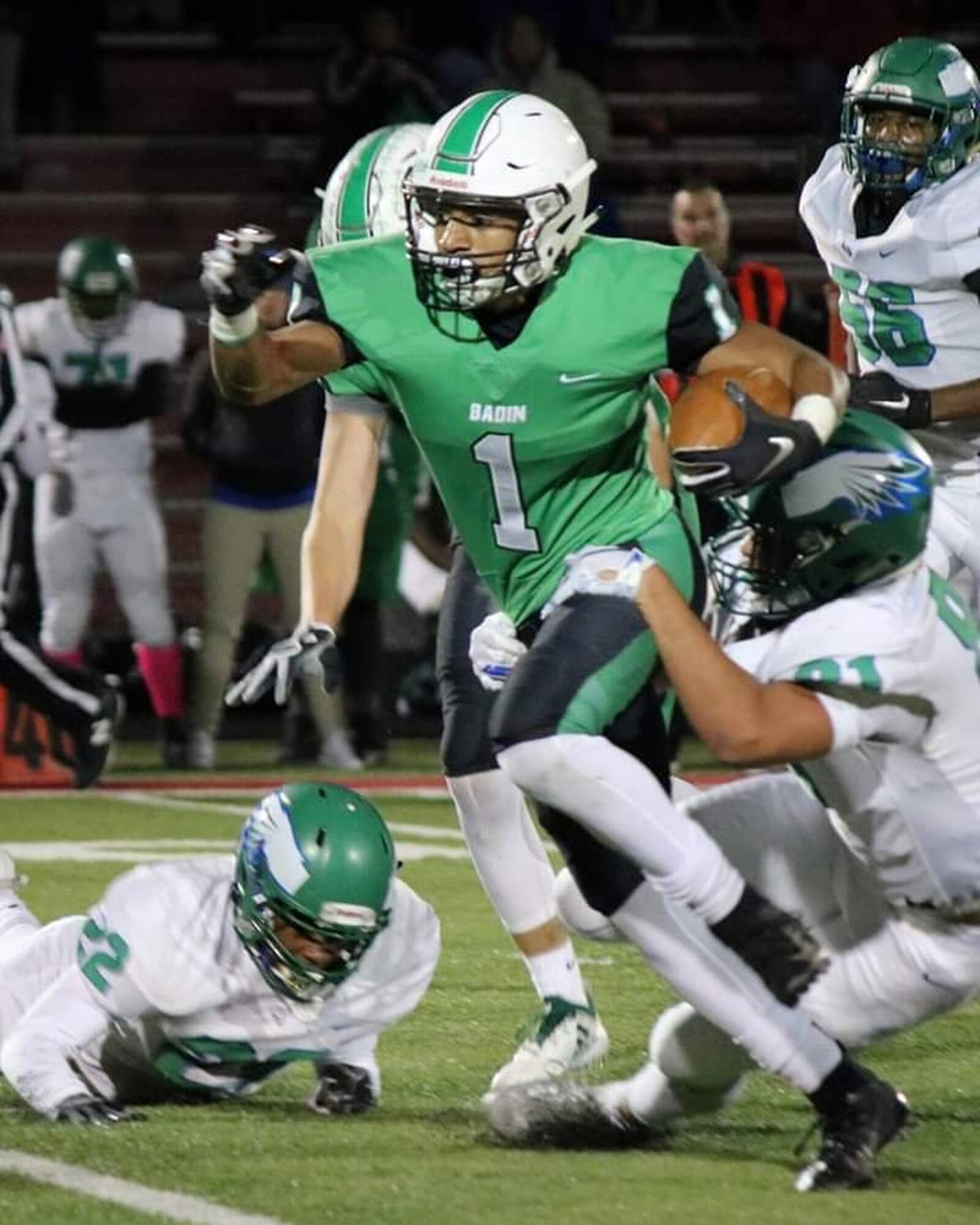 Badin’s Davon Starks cuts through the Chaminade Julienne defense Friday night during a 38-21 victory at Fairfield Stadium in Fairfield. CONTRIBUTED PHOTO BY TERRI ADAMS