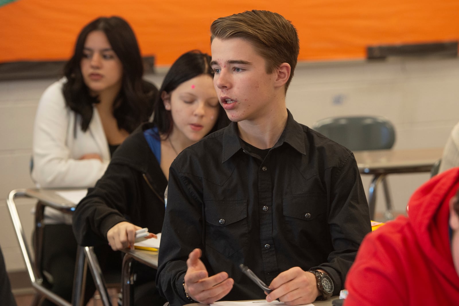 FILE - Mansfield Senior High School freshman Nathan Baker, 14, speaks during his health class on sleep, in Mansfield, Ohio, Dec. 6, 2024. (AP Photo/Phil Long, File)