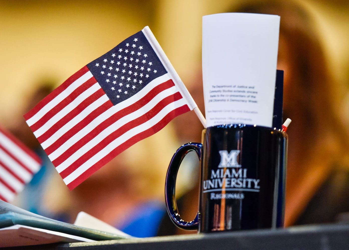 Nearly 100 people become U.S. citizens at naturalization ceremony at Miami Hamilton