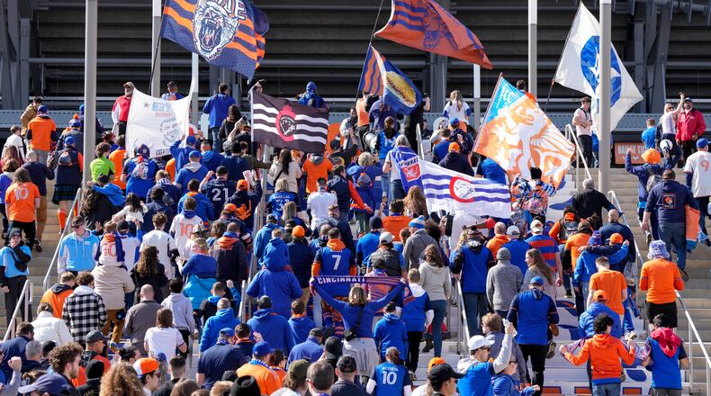 FC Cincinnati supporters march to the stadium prior to an MLS soccer match against Toronto FC, Sunday, Feb. 25, 2024, in Cincinnati. (AP Photo/Jeff Dean)