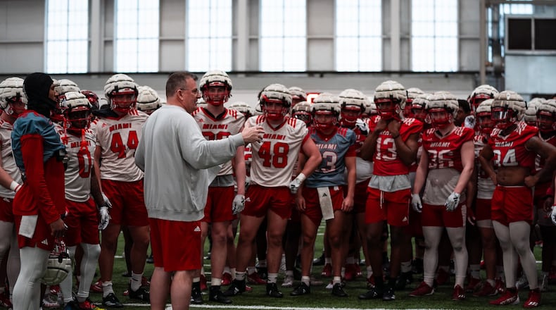 Miami football coach Chuck Martin talks with his team during a recent spring practice in Oxford. Miami Athletics/CONTRIBUTED PHOTO