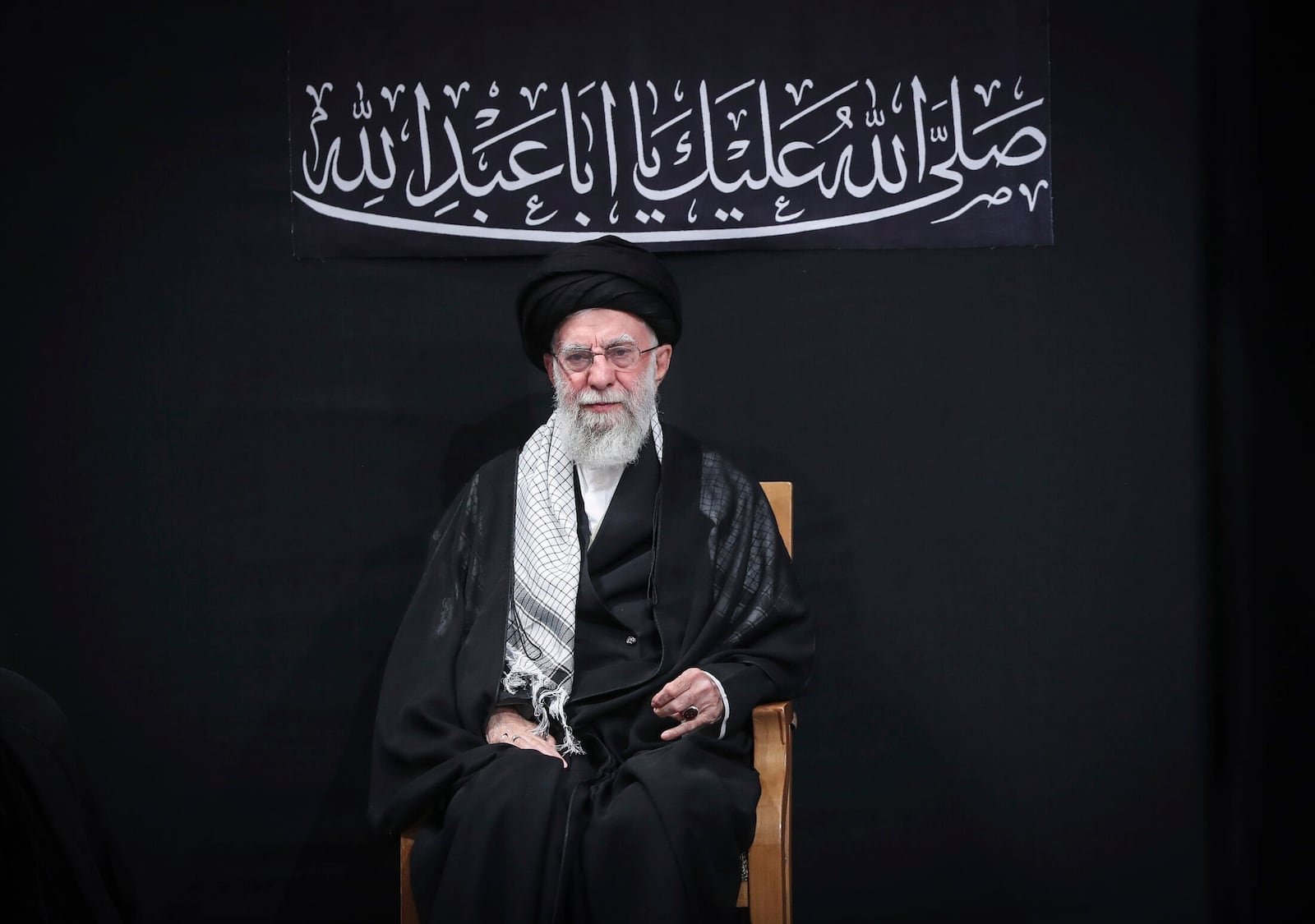 In this photo provided by the Office of the Iranian Supreme Leader, Supreme Leader Ayatollah Ali Khamenei attends a mourning ceremony commemorating the death anniversary of the Prophet Muhammad's grandson, Hussein, in Tehran, Iran, on Saturday, July 6, 2025. (Office of the Iranian Supreme Leader via AP)
