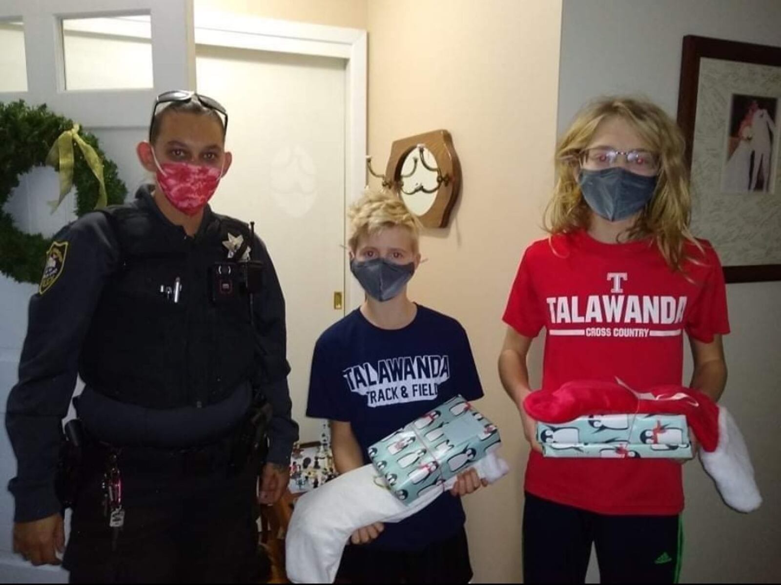 Oxford Twp. Constable Cynthia Smith shown with Jacob and Nolan Hodgson. CONTRIBUTED