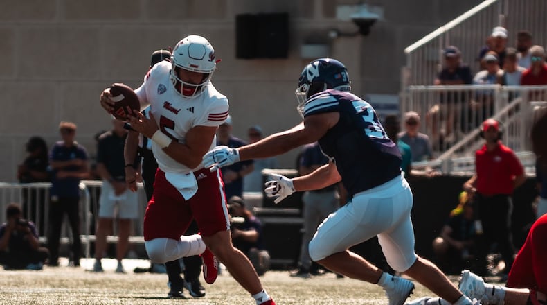 Miami quarterback Brett Gabbert tries to avoid the rush during Saturday's game vs. Northwestern. Miami Athletics photo