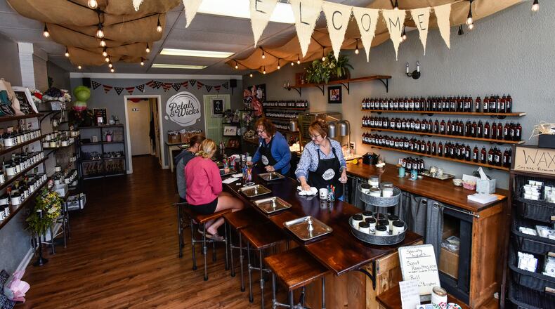 Petals & Wicks is now open at 119 Main Street in Hamilton. Petals & Wicks offers a variety of premade scented candles and options to create your own custom scented candles, tarts and sprays. NICK GRAHAM/STAFF