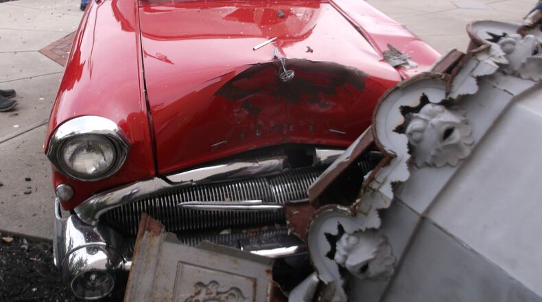A fountain at the corner of High and Martin Luther King Boulevard in Hamilton was destroyed Tuesday evening after a restored 1957 Buick crashed into it. HAMILTON POLICE DEPARTMENT