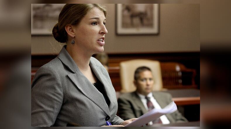 E.L. Hubbard photography
Assistant Prosecuting Attorney Kelly Heile addresses Judge H.J. Bressler as Detective Paul Davis listens during the sentencing for Donald Lamb in Butler County Common Pleas Court Monday, June. 11, 2012.
