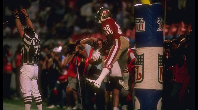 Wide receiver John Taylor of the San Francisco 49ers scores the game-winning touchdown during Super Bowl XXIII against the Cincinnati Bengals at Joe Robbie Stadium in Miami, Fla. The 49ers won the game, 20-16. Mike Powell /Allsport
