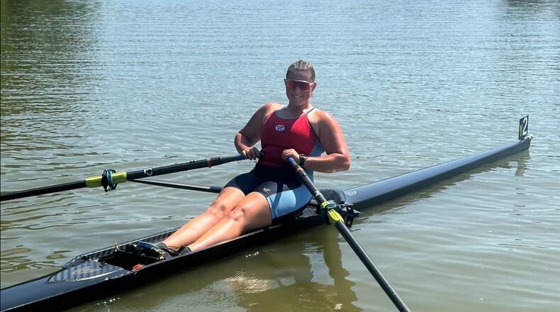 Becca Kraft takes a break from rowing while practicing at the Great Miami Rowing Center. CONTRIBUTED PHOTO