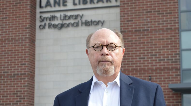 Curtis Ellison, president of the Lane Library board of trustees this year, stands in front of the Oxford Lane Library, which also houses the Smith Library of Regional History. CONTRIBUTED/BOB RATTERMAN