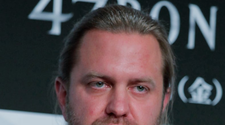 FILE - Director Carl Rinsch poses for photographers during a news conference to promote his 3-D film "47 RONIN" in Tokyo, Japan, Nov. 18, 2013. (AP Photo/Shuji Kajiyama, File)