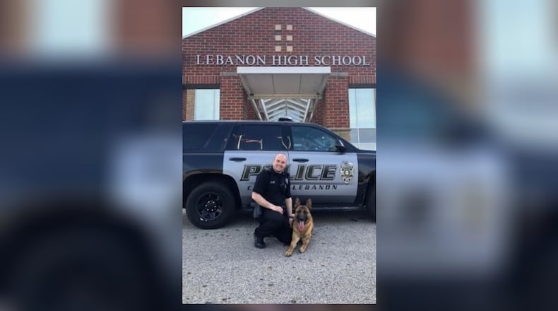 Lebanon Police Officer Eric Holmes and Max, the new drug detection dog acquired by the school district to patrol schools, activities.
