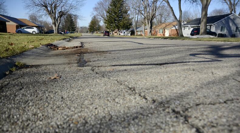 Vinnedge Avenue is one of four streets that have a deterorating concrete base the city will replace this year. MICHAEL D. PITMAN/STAFF
