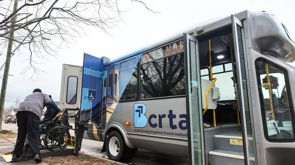 A Butler County Regional Transit Authority bus stops to let off riders in Middletown Wednesday, Dec. 10, 2025. NICK GRAHAM/STAFF